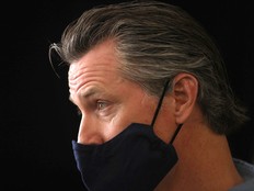 In this file photo taken on June 3, 2020, California Governor Gavin Newsom is interviewed while visiting the Hot and Cool Cafe in Los Angeles.