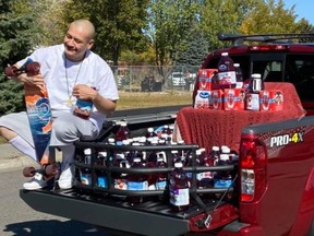 Nathan Apodaca with a red truck gifted to him by Ocean Spray after a TikTok video of him skateboarding to Fleetwood Mac's 'Dreams while drinking from a bottle of Ocean Spray went viral.