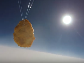 A Wales-based supermarket has launched a chicken nugget into space to celebrate its 50th anniversary.