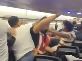 A wild brawl on a Spirit Airways flight from New Jersey to Puerto Rico was captured by a passenger when the aircraft landed in San Juan, where a woman who reportedly refused to wear a mask was tasered by police.
