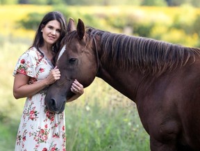Equine therapist Prairie Conlon and her therapy horse True.