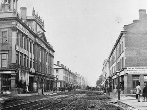 King St. looking west across Jarvis St. with the St. Lawrence Hall on the extreme left. It opened in 1850-51. Note the horsecar tracks on King. Horse-drawn streetcars arrived on this street, operating between the Don River and Bathurst St., starting in 1874 and making it the city's third "transit" route. This line was electrified in 1892 and, of course, the KING 504 streetcar still operates although in a much modified form.