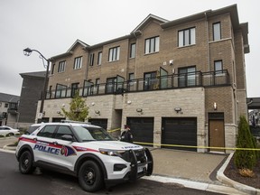 York Regional Police at the scene on Feeney Lane, near the Bayview Ave. and Hwy. 7 in Markham, on Thursday, Oct. 22, 2020, the day after a man was found dead.