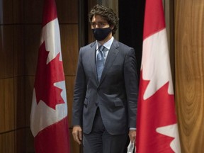 Prime Minister Justin Trudeau arrives for a news conference Tuesday Oct. 20, 2020 in Ottawa.