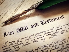 Last Will and Testament document with quill pen.