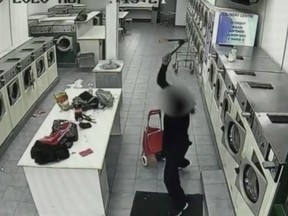 Toronto Police are investigating after a man was caught on CCTV assaulting another man in a Brockton Village laundromat Monday afternoon.