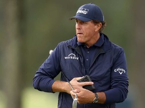 Phil Mickelson of the United States walks across the second green during the second round of the 120th U.S. Open Championship on Sept. 18, 2020 at Winged Foot Golf Club in Mamaroneck, N.Y.