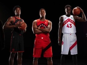 Kyle Lowry, Pascal Siakam and OG Anunoby show off three of the five new Toronto Raptors jerseys.