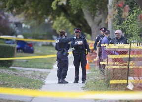 Toronto Police attend the scene of a deadly drive-by shooting on Patika Ave., west of Merrill Ave., in the Lawrence and Jane area on Thursday, Oct. 1, 2020.
