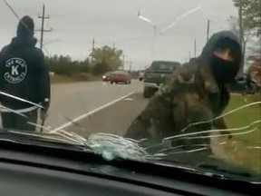 This image, taken from a video released by the OPP on Sunday, shows the crack in an OPP officer’s windshield after a protester hurled a rock at his vehicle.