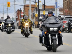 Bikers roll through Port Dover on Friday, March 13 2020.