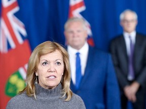 Ontario Health Minister Christine Elliott holds a press conference regarding new restrictions at Queen's Park during the COVID-19 pandemic in Toronto on Friday, October 2, 2020.