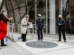 On October 29, a large black granite disc commemorating the Colonial Tavern was returned to Yonge St., as a
permanent landmark on the site of the iconic jazz club. SUPPLIED
