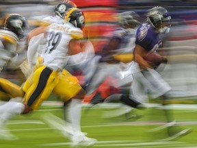 Wide receiver Willie Snead of the Baltimore Ravens carries the ball against the Pittsburgh Steelers during the first half at M&T Bank Stadium on November 1, 2020 in Baltimore, Maryland.