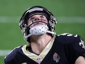 Drew Brees of the New Orleans Saints reacts following a play during their game against the San Francisco 49ers at Mercedes-Benz Superdome on November 15, 2020 in New Orleans, Louisiana.