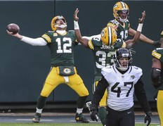 Green Bay Packers quarterback Aaron Rodgers celebrates a touchdown earlier this season.