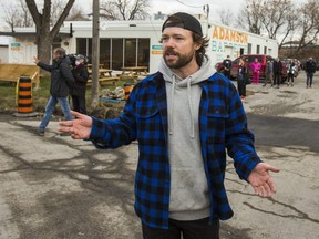 Adam Skelly, owner of Adamson Barbecue in Etobicoke, outside his eatery as he defied public health rules and opened for indoor dining on Nov. 24, 2020.