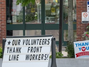 "Thank you" signs are on display outside the Seven Oaks Long-Term Care Home in Toronto on Thursday June 25, 2020.