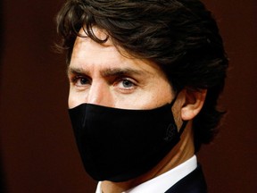 Canada's Prime Minister Justin Trudeau listens to Governor General Julie Payette deliver the Throne Speech in the Senate, as parliament prepares to resume in Ottawa, Ontario, Canada September 23, 2020.  REUTERS/Blair Gable ORG XMIT: GGG-OTW113