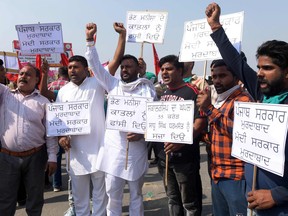 Activists of the Valmiki Dharam Samaj Sangathan shout slogans during a  protest against the alleged gang-rape and murder of a low-caste teenaged woman at Bool Garhi village in Uttar Pradesh state, in Amritsar.