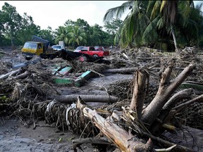 View of destruction at a banana field as workers prepare to evacuate it in El Progreso, Yoro department, Honduras, on Nov. 14, 2020, before the arrival of Hurricane Iota.