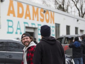 Adam Skelly, the owner of Adamson Barbecue in Toronto, opened his business a day after city officials ordered his restaurant to close, on Wednesday, Nov. 25, 2020.