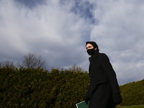 Prime Minister Justin Trudeau leaves after making an announcement at the Ornamental Gardens in Ottawa, Thursday, Nov. 19, 2020