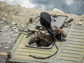 An Indian army convoy drives towards Leh, on a highway bordering China, in June.