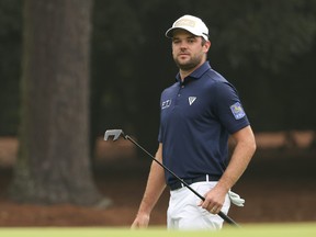 Canadian Corey Conners stands on the first green during the final round of the Masters on Sunday.