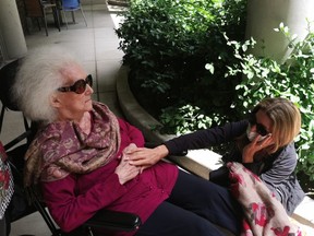 Elly Miller visits her 99-year-old mom Doris, who suffers from Alzheimers, at her long-term care home over the summer.