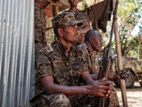 Ethiopian soldiers rest at the 5th Battalion  of the Northern Command of the Ethiopian Army in Dansha, Ethiopia, on Wednesday, Nov. 25, 2020.