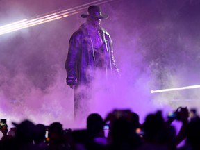 World Wrestling Entertainment star The Undertaker makes his way to the ring during a match at the World Wrestling Entertainment (WWE) Super Showdown event in the Saudi Red Sea port city of Jeddah late on January 7, 2019.