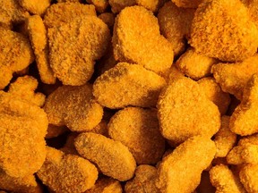 Chicken nugget is a snack made from grounded chicken, laminated with some bread crumbs.