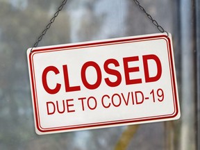Closed sign due to COVID-19.