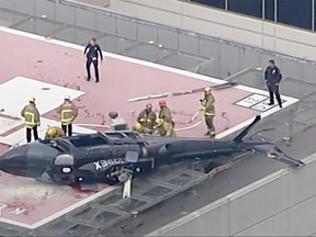 A helicopter ambulance transporting a heart awaiting transplant crashed as it attempted to land on the building’s roof.