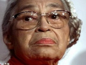 This 1999 file photo  shows U.S. civil rights heroine Rosa Parks attending the opening of "Marching Toward Justice: The History of the 14th Amendment of the U.S. Constitution" ribbon cutting ceremony in Washington D.C.