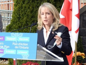 Merrilee Fullerton, the Ontario Minister of Long-Term Care, announces more money for care homes in front of Maple View Lodge, in Athens, Ont., Nov. 12, 2020.