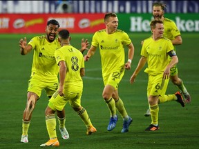 Nashville SC players celebrate after a goal of their team's 3-0 win over Inter Miami on Nov. 20, 2020, at Nissan Stadium in Nashville.