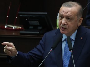 Turkish President and leader of the Justice and Development Party (AK Party) Recep Tayyip Erdogan speaks during his party's group meeting at the Turkish Grand National Assembly in Ankara on Nov. 11, 2020.