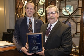 Toronto Press and Media Club President, Ed Patrick inducts Mark Bonokoski into the Canadian News Hall of Fame at the Toronto Press and Media Club on Tuesday November 21, 2017. (CRAIG ROBERTSON/TORONTO SUN FILES)