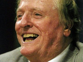 Writer William F. Buckley Jr. attends a book signing for his new book "Elvis in the Morning" in New York City, Aug. 14, 2001.