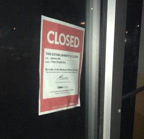 A Toronto Public Health notice ordering Adamson Barbecue closed.