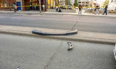 The following photograph depicts the pieces from the van that fell off as a result of crossing over the median.