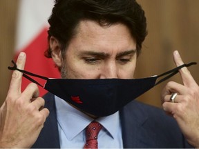 Prime Minister Justin Trudeau provides an update on the COVID pandemic during a press conference in Ottawa on Friday, Nov. 13, 2020.