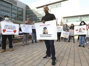Nar Sandhu, whose nephew Jag Brar, 19, was killed in a multi-car crash in Mississauga on Oct. 10, and others rally outside the Brampton courthouse as a bail hearing was held for accused impaired driver Peter Simms, 46, of Orangeville, on Friday, Nov. 6, 2020.