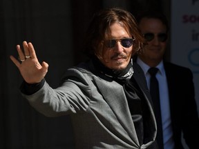 Johnny Depp arrives at the Royal Courts of Justice, the Strand, in London, England, on Tuesday, July 28, 2020.