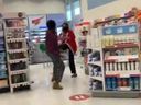 A woman nearly strikes and kicks a Shoppers Drug Mart employee in Scarborough in a video posted online.