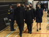 Const. Marc Hovingh’s wife Lianne and their four children — Laura, Nathan, Elena and Sarah — hold hands as they enter the OPP officer’s funeral service together on Saturday, Nov. 28, 2020.