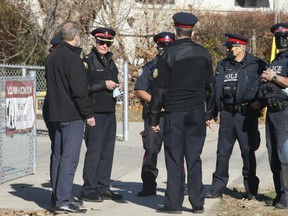 Toronto Police Supt. Ron Taverner (second left) was out in the Jane St. and Stong Crt. area where an innocent 12-year-old boy, was shot inadvertently during shootout, and has now died on Thursday, Nov. 12, 2020.