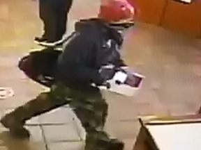An image released by Halton Regional Police of the suspect in a poppy donation box theft at an Oakville Tim Hortons on Monday, Nov. 9, 2020.